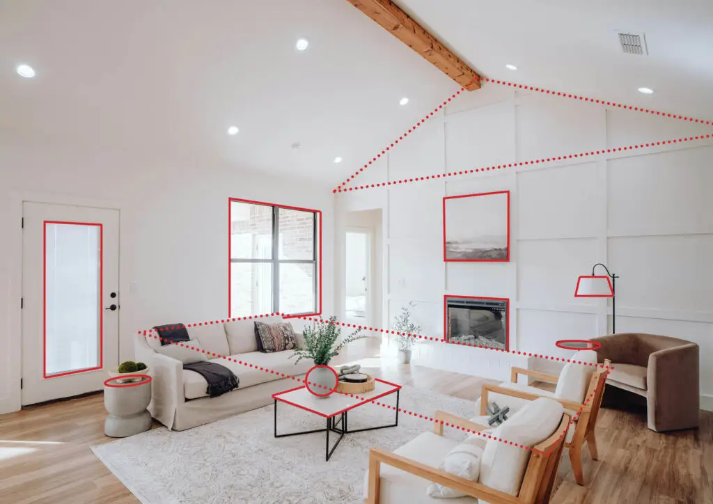 Large living room with couch and two chairs centered on an inset wall fireplace. The image has red lines outlining shapes in the room
